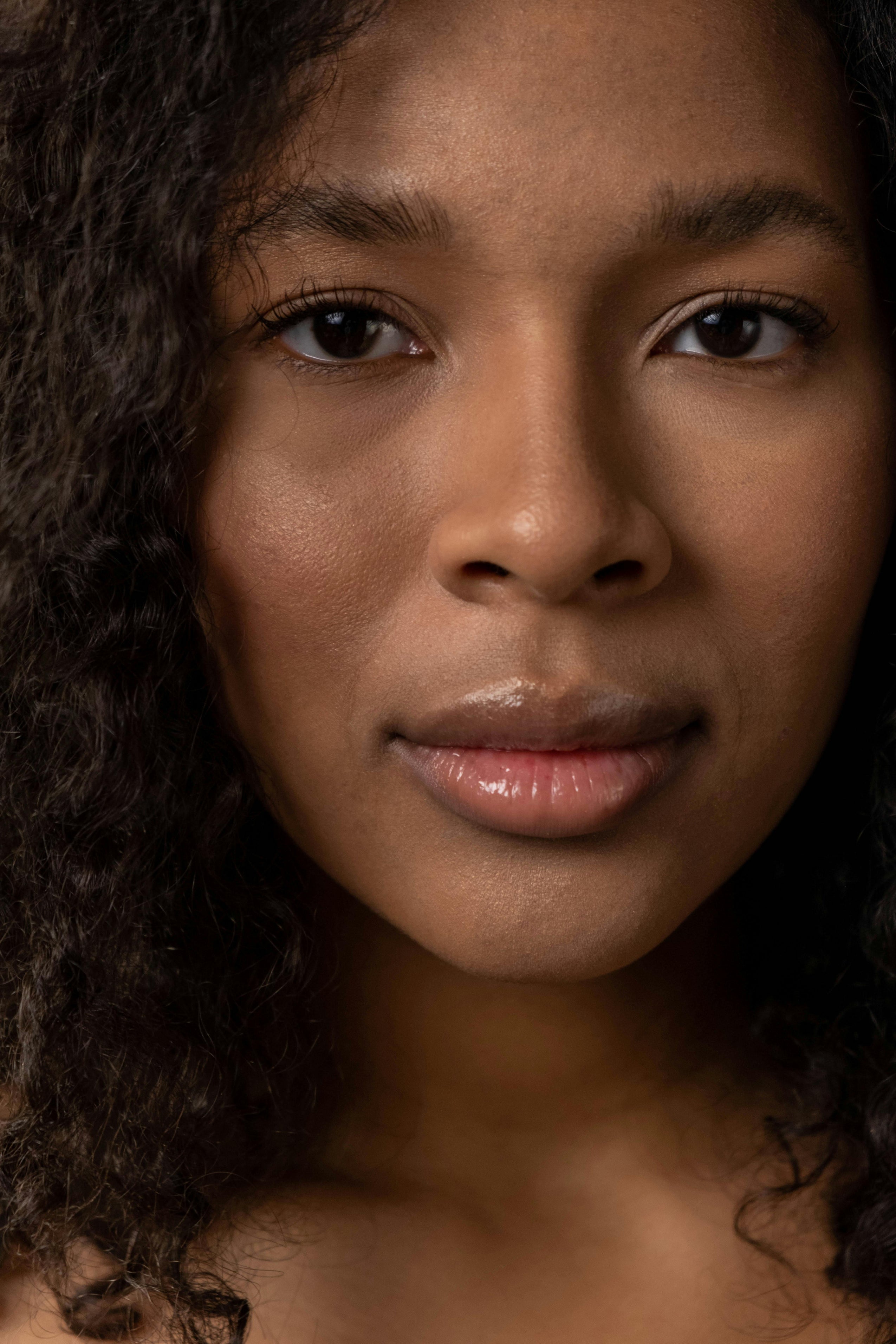 Close-up of a woman's face with a neutral expression